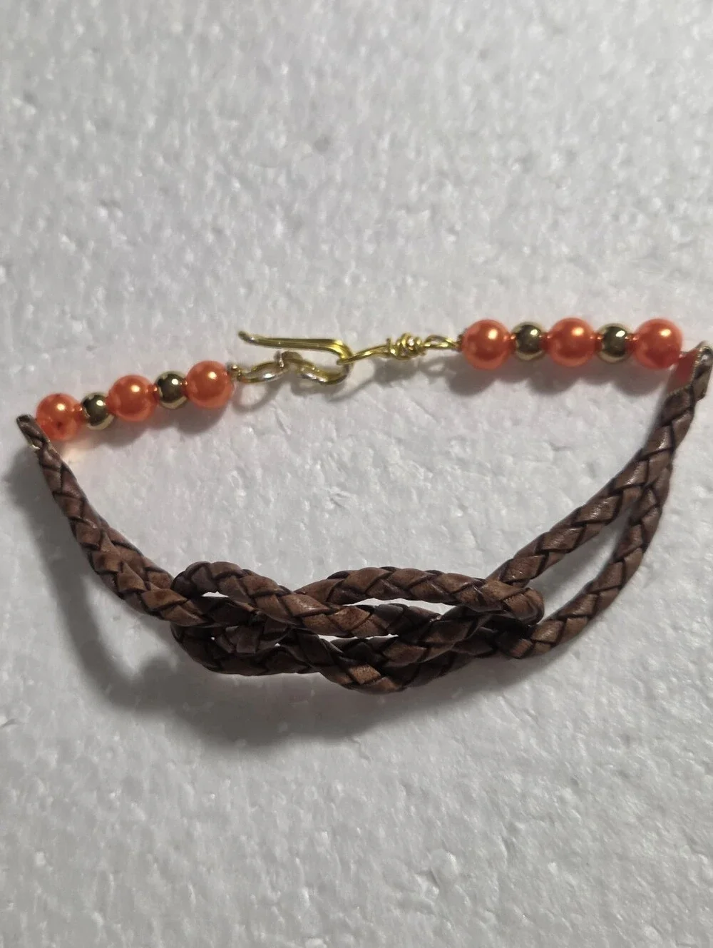 Handcrafted Orange Faux Pearl & Brown Braided Leather Bracelet